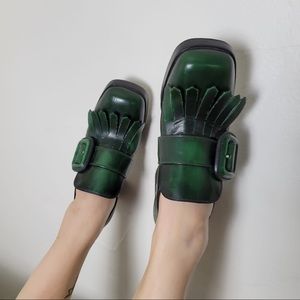 Gorgeous MIUMIU Healed loafers in green leather. 381/2 Good condition.